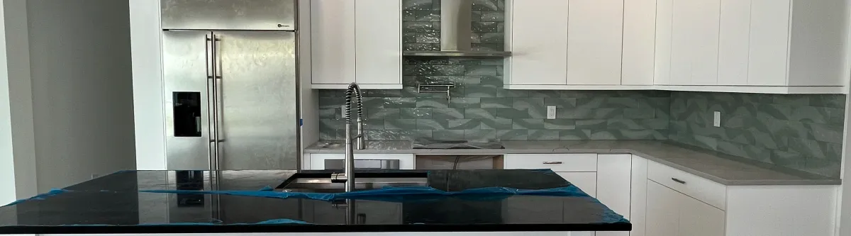 EG Custom Cabinets Beautifully finished custom walk-in closet interior by EG Contractors