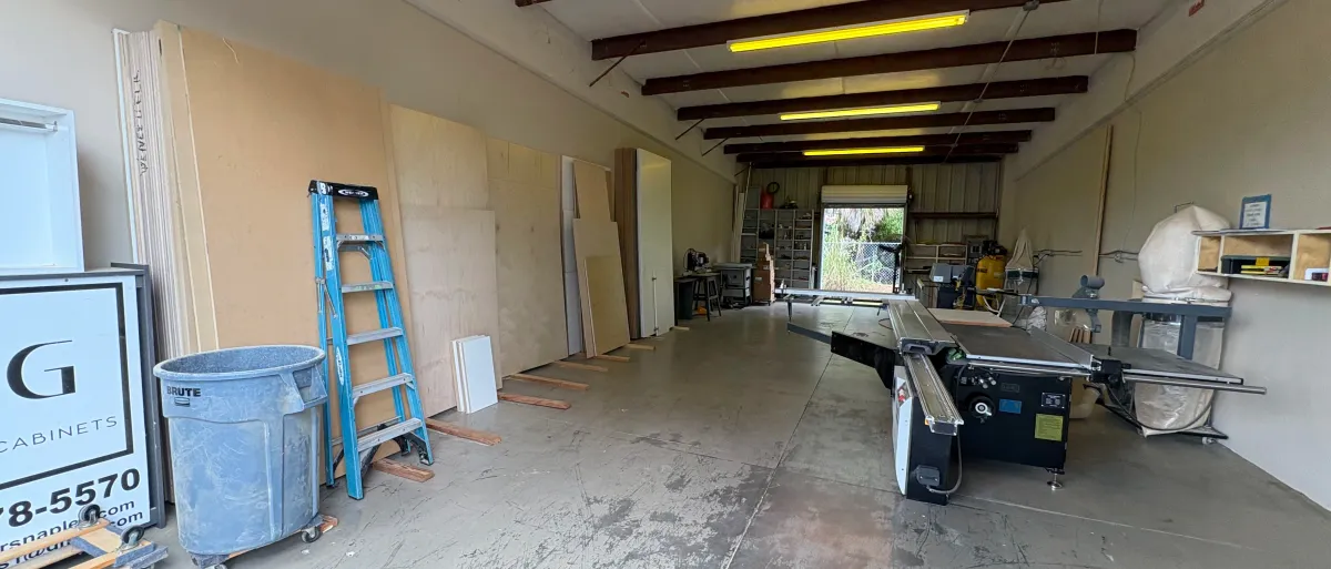 EG Custom Cabinets EG Contractors custom cabinet workshop with tools, materials, and finished cabinets in Naples, FL