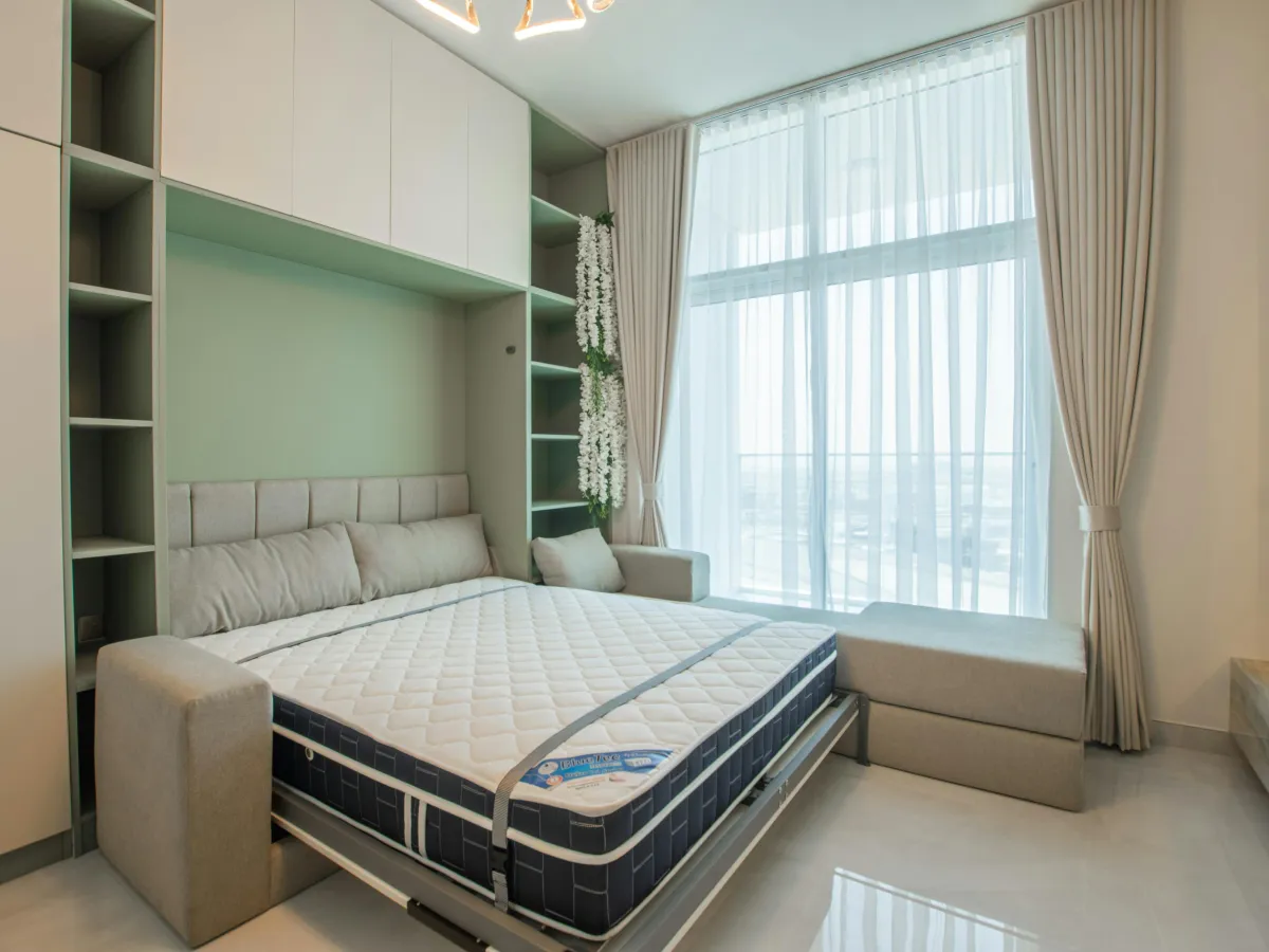 Murphy bed with built-in side cabinets and desk in Marco Island, FL