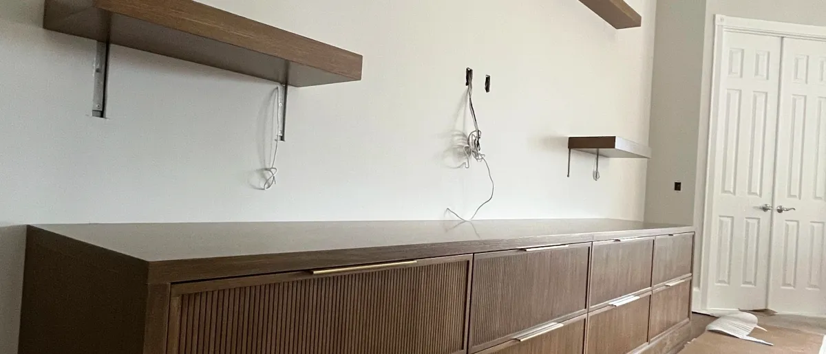 EG Custom Cabinets Custom home office with built-in desk and bookcases by EG Contractors in Naples, FL