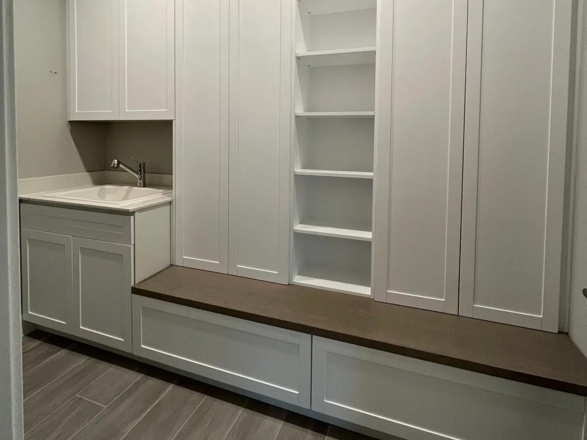 EG Custom Cabinets Kids closet with lower rods and adjustable shelving