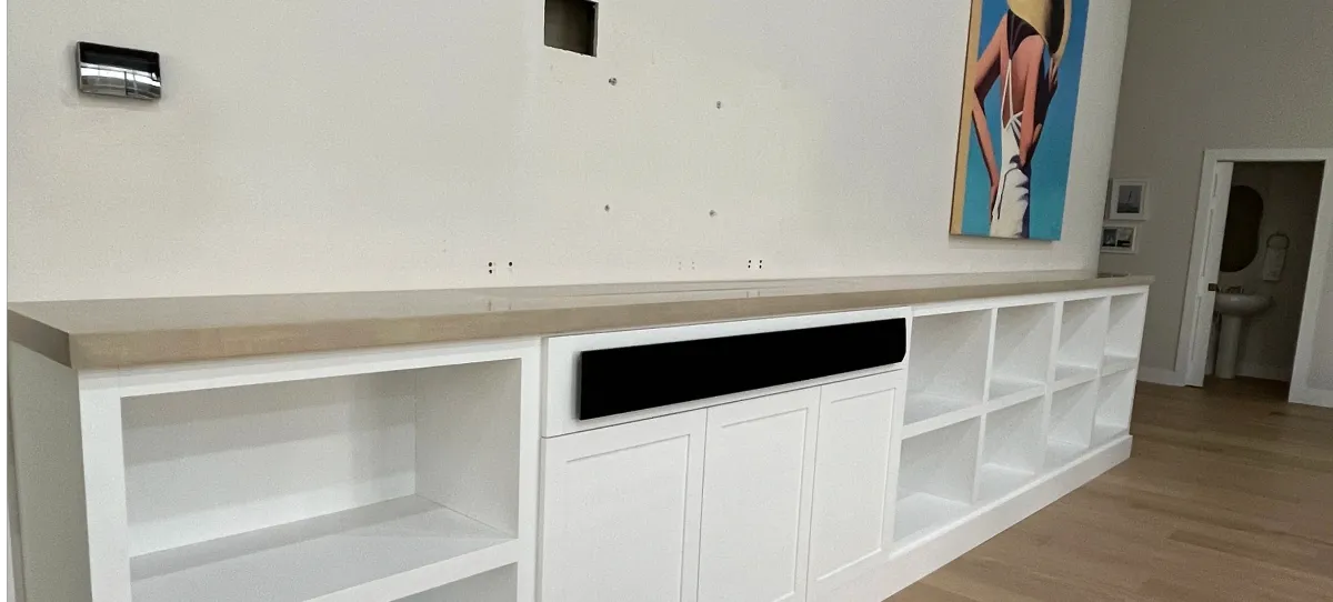 EG Custom Cabinets Custom entertainment center with floating shelves by EG Contractors in Naples, FL